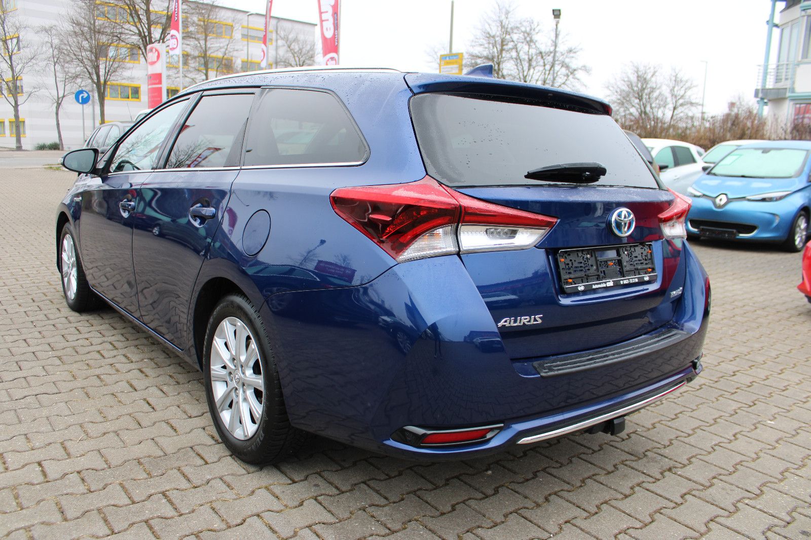 Fahrzeugabbildung Toyota Auris Touring Hybrid 1,8-l-VVT Team Deutsch