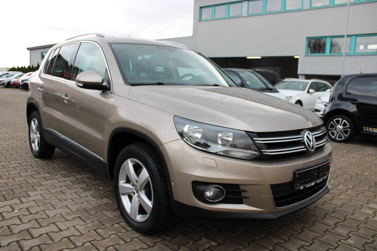 Fahrzeugabbildung Volkswagen Tiguan 1.4 TSI 4MOTION CUP Sport & Style